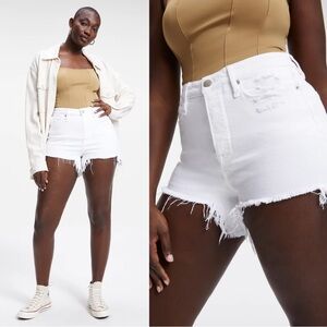 Good American • Bombshell Short white denim distressed cutoff frayed raw hem
